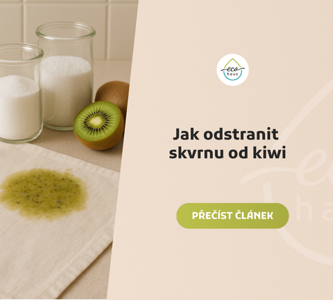 Fotografie zobrazuje velkou skvrnu od kiwi na světlé textilii položené na béžové kuchyňské desce