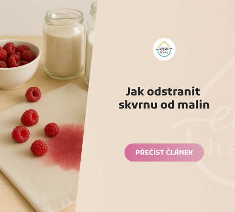 Skvrna od malin na béžovém ubrusu, kolem čerstvé maliny