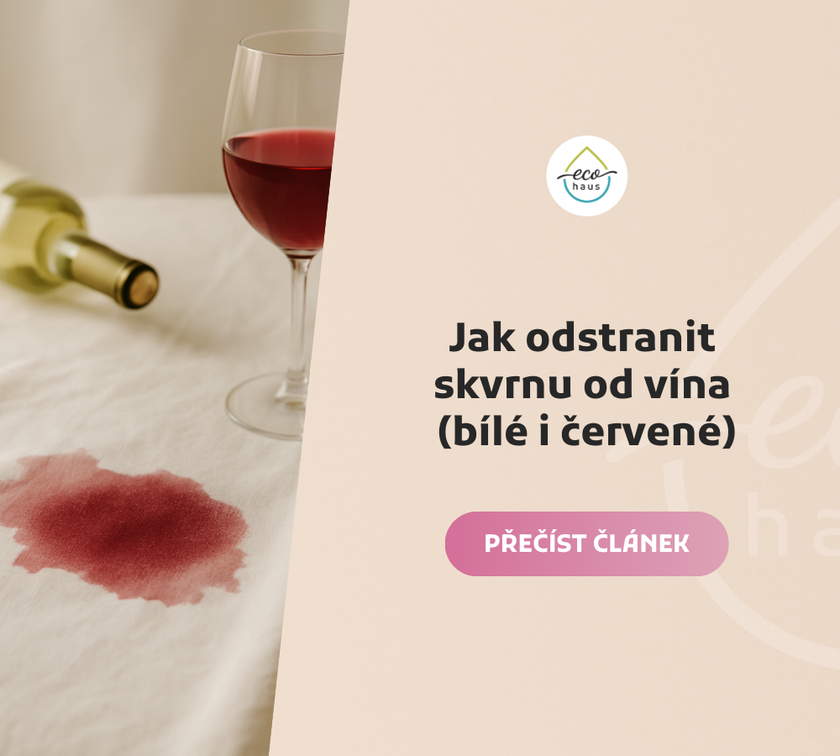 Stain from red wine on a light-colored tablecloth, with a glass of red wine and a white wine bottle nearby in soft, natural light. The scene is arranged horizontally with a calm, realistic atmosphere and no people or labels visible.