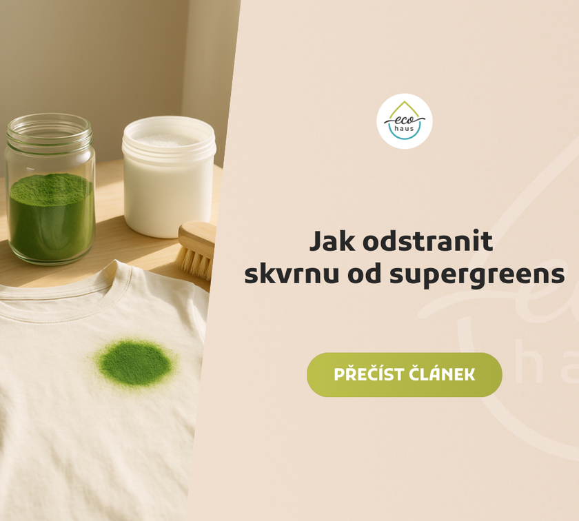 A light and airy cleaning scene featuring an off-white T-shirt with a vivid green stain from supergreens powder, laid flat on a wooden surface.