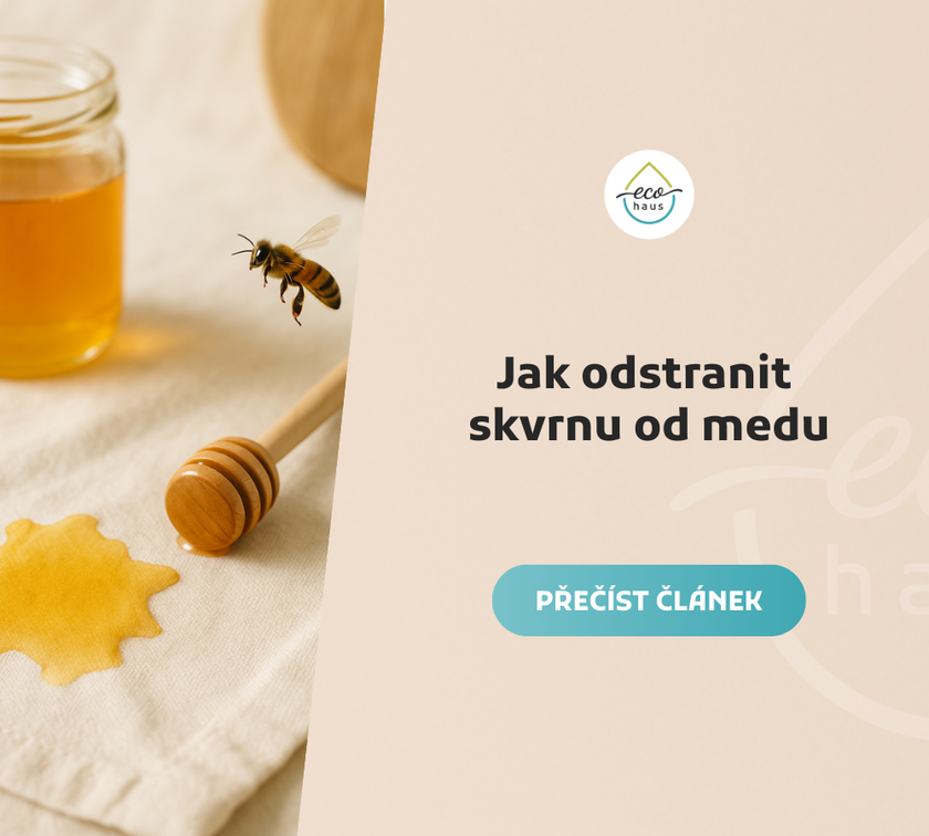 Honey stain on a light cream-colored fabric with a golden honey jar, a wooden honey dipper, and a hovering bee in natural soft light; the scene evokes a clean, warm, and peaceful atmosphere.
